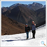 Trekking over Tizi Mzik with Ouka&iuml;meden and Angour in the distance